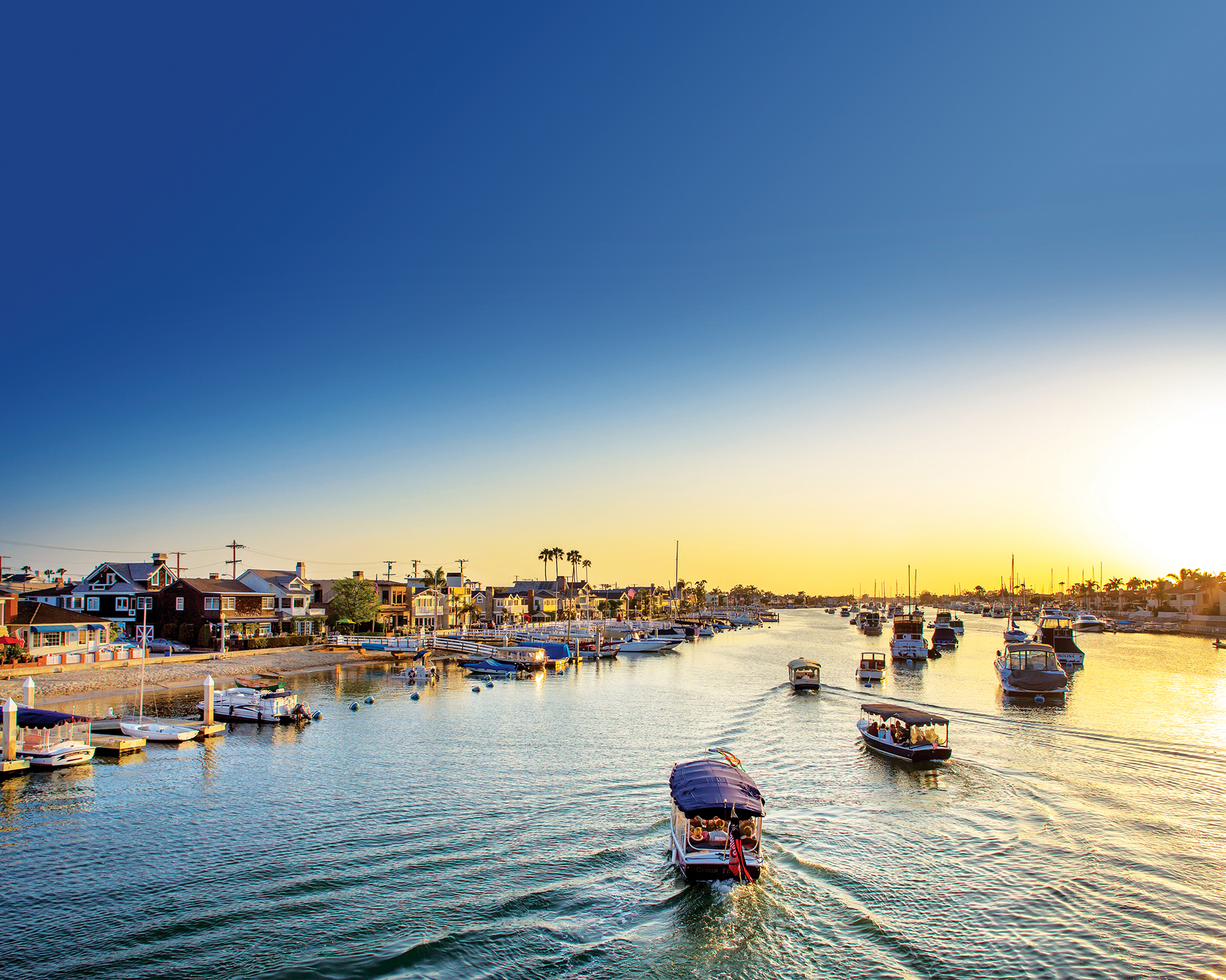 Image of Balboa island and the harbor with duffy boats.